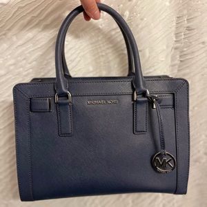 Michael Kors crossbody or shoulder bag.
